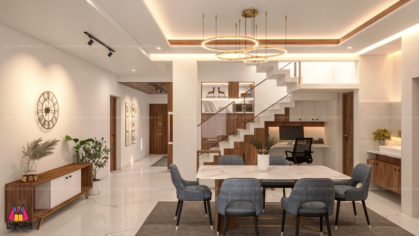 Open plan living and dining pavilion with sculptural ring chandeliers